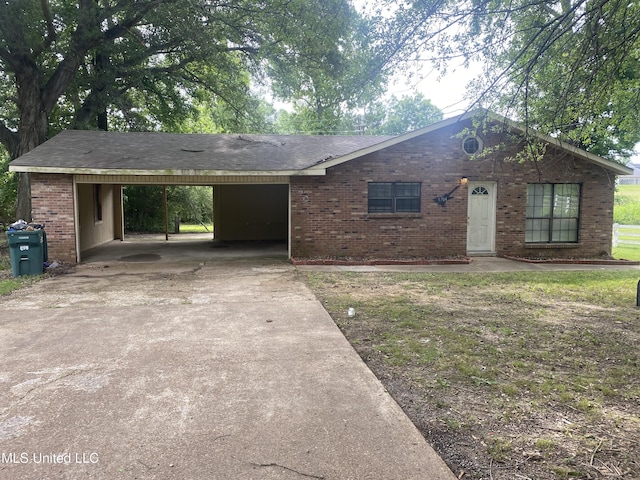 5704 Westminister Ln, Southaven, MS 38671 - ranch-style house with an attached carport, concrete driveway, and brick siding