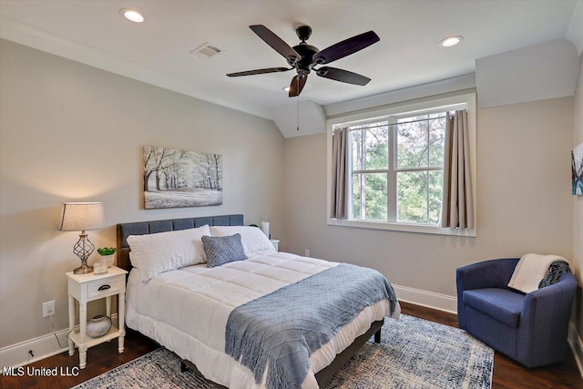 bedroom featuring dark hardwood / wood-style flooring and ceiling fan