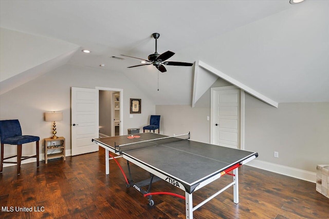 rec room with ceiling fan, dark wood-type flooring, and vaulted ceiling