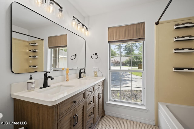 full bathroom featuring double vanity, walk in shower, a tub, and a sink