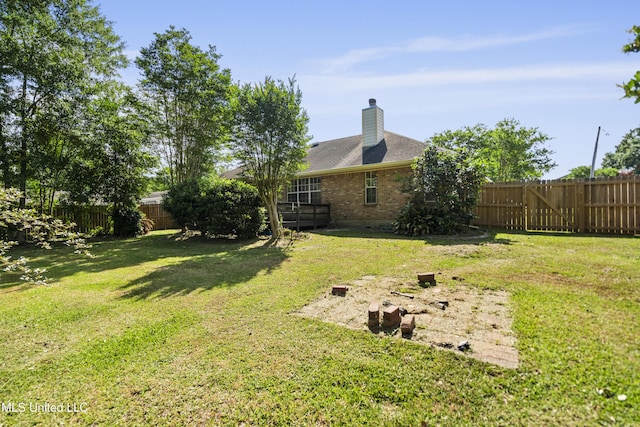 view of yard featuring a fenced backyard