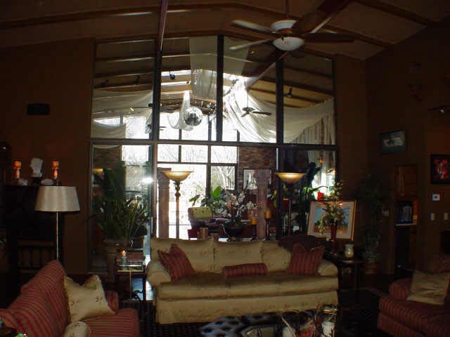 living room featuring ceiling fan