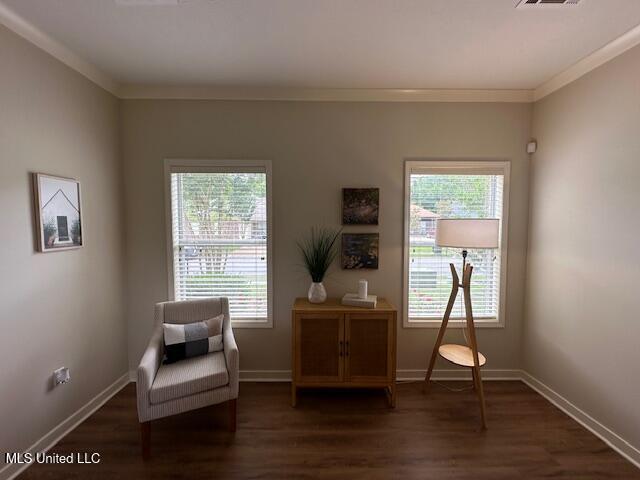 935 Frisky Dr, Brandon, MS 39047 - sitting room featuring ornamental molding, healthy amount of natural light, baseboards, and dark wood finished floors