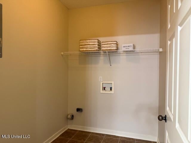 935 Frisky Dr, Brandon, MS 39047 - laundry area with baseboards, hookup for a washing machine, and dark tile patterned floors