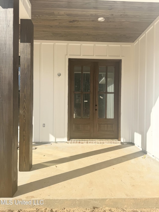 property entrance featuring french doors