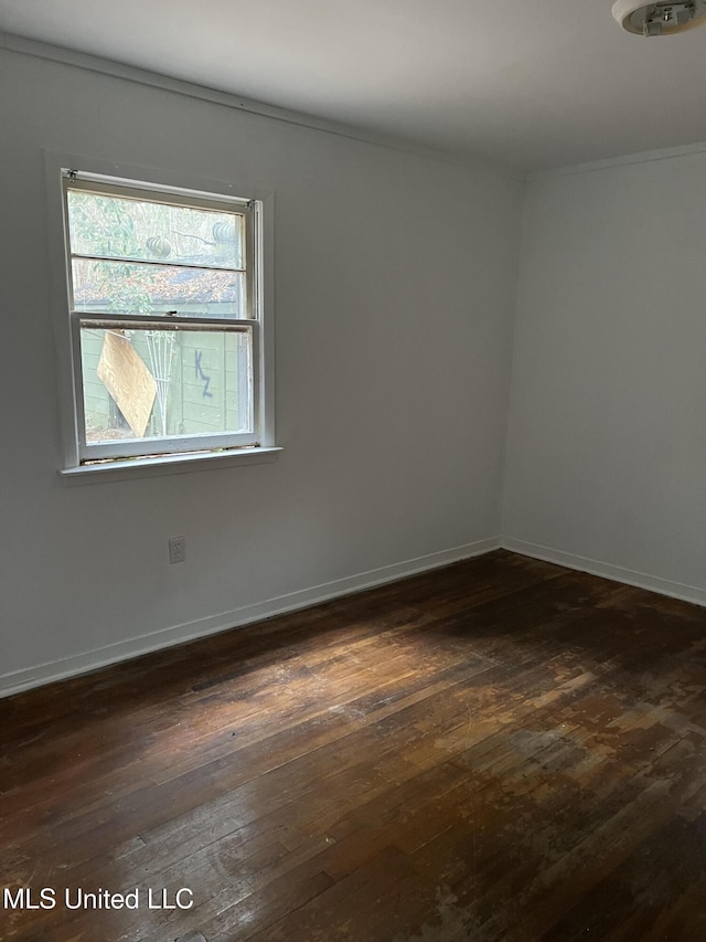 2643 Pinebrook Dr, Jackson, MS 39212 - empty room featuring dark wood-style floors and baseboards