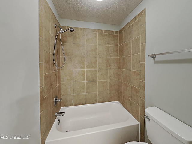 1764 Dorchester Dr, Southaven, MS 38671 - bathroom featuring toilet, a textured ceiling, and shower / washtub combination