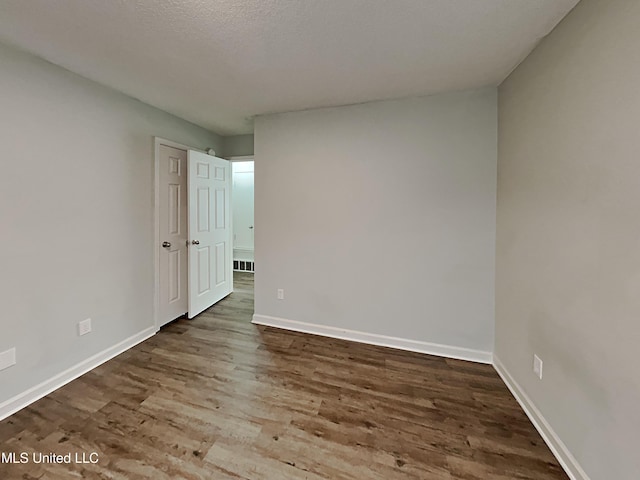 1764 Dorchester Dr, Southaven, MS 38671 - empty room featuring wood finished floors and baseboards