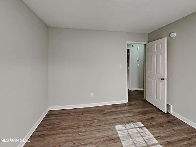 1764 Dorchester Dr, Southaven, MS 38671 - unfurnished bedroom with wood finished floors and baseboards