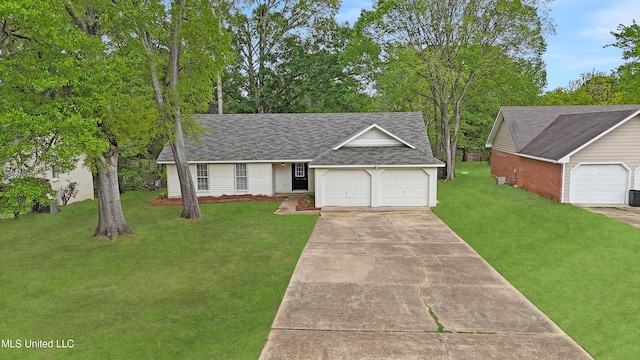 ranch-style home with concrete driveway, a shingled roof, an attached garage, and a front lawn