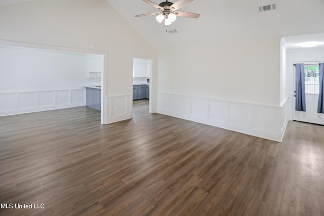 unfurnished living room with dark wood-type flooring, visible vents, and ceiling fan