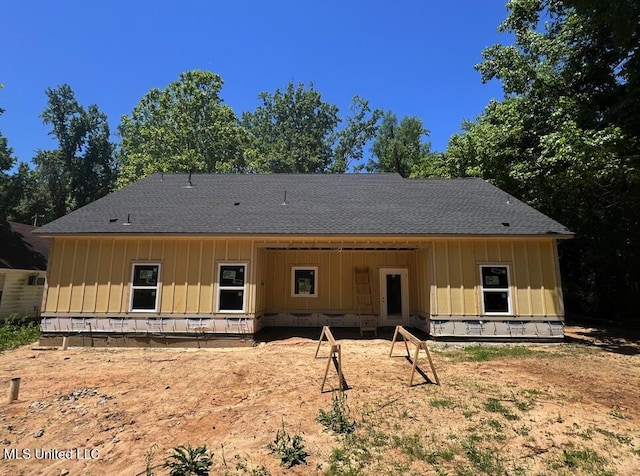 7356 Mockingbird Ln, Olive Branch, MS 38654 - back of house featuring board and batten siding and roof with shingles