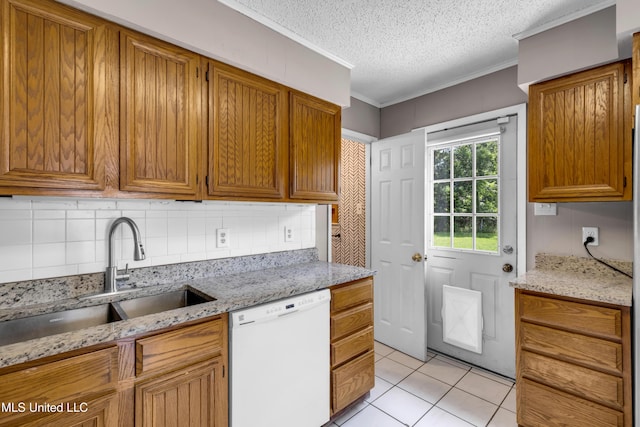 7105 Mandarin Dr, Biloxi, MS 39532 - kitchen with dishwasher, tasteful backsplash, light tile patterned flooring, a textured ceiling, and ornamental molding