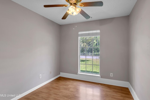 7105 Mandarin Dr, Biloxi, MS 39532 - spare room with plenty of natural light, light wood-style flooring, a ceiling fan, and a textured ceiling