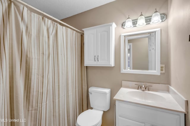 7105 Mandarin Dr, Biloxi, MS 39532 - bathroom with vanity and a textured ceiling