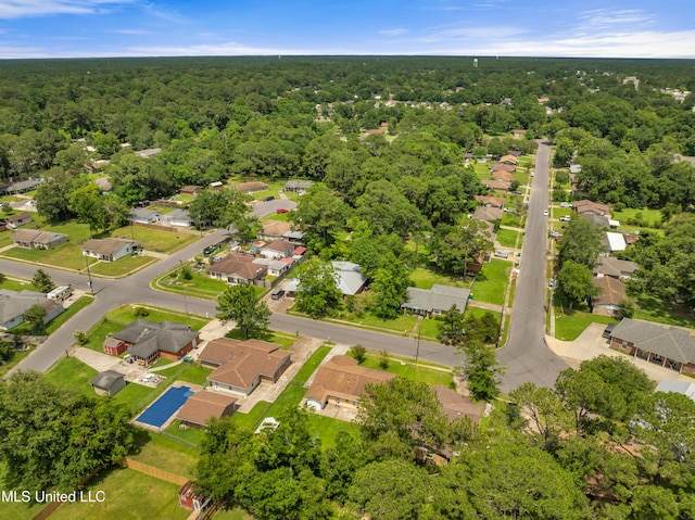 7105 Mandarin Dr, Biloxi, MS 39532 - aerial perspective of suburban area with a forest