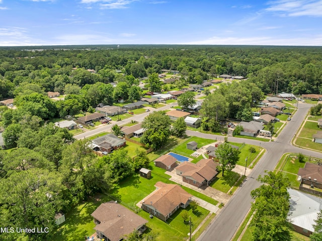 7105 Mandarin Dr, Biloxi, MS 39532 - aerial perspective of suburban area with a heavily wooded area
