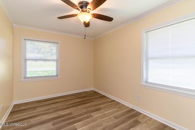 13128 Hanover Dr, Ocean Springs, MS 39564 - spare room with wood finished floors, ornamental molding, and a ceiling fan