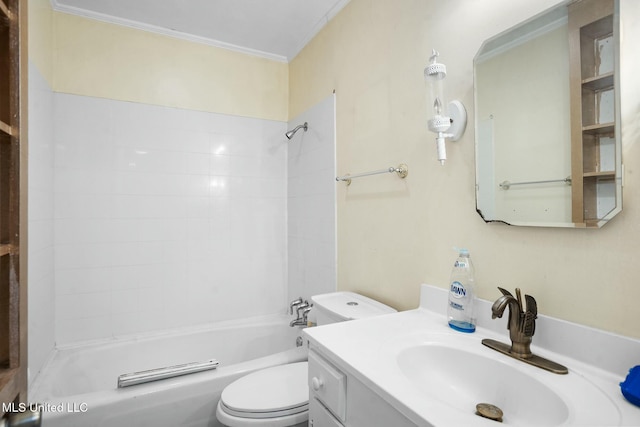 bathroom featuring toilet, ornamental molding,  shower combination, and vanity