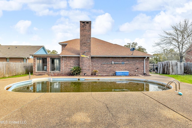 view of pool featuring a patio, fence private yard, and a fenced in pool