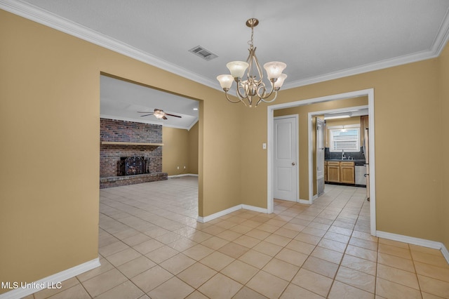 spare room with light tile patterned floors, visible vents, a brick fireplace, and ornamental molding