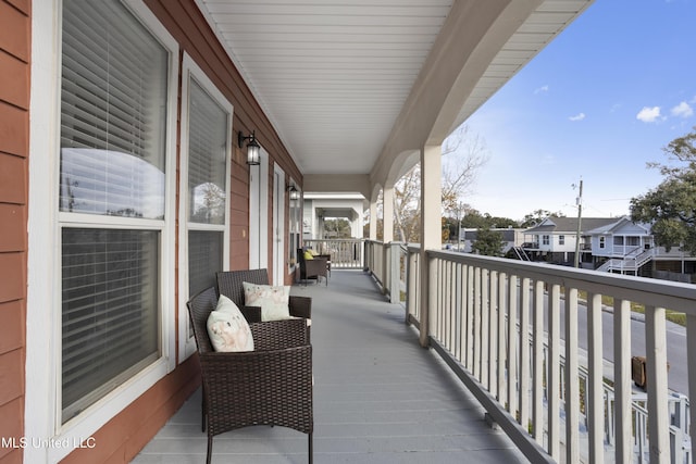 balcony featuring covered porch