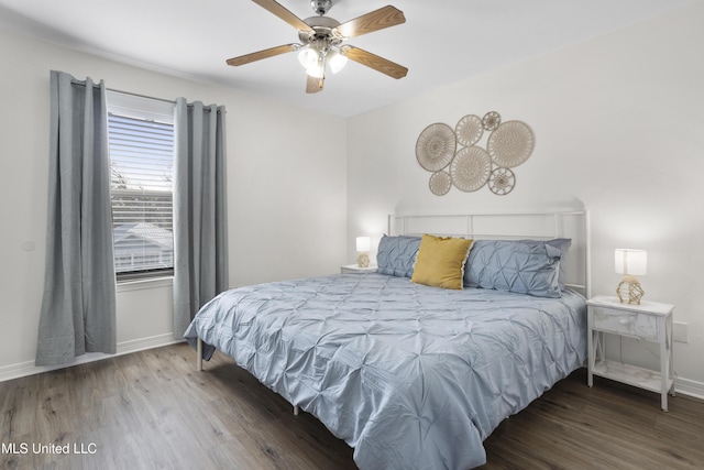 bedroom with hardwood / wood-style floors and ceiling fan