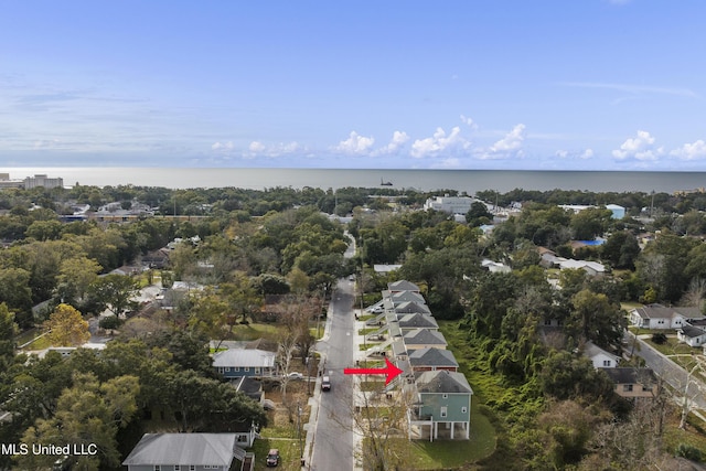 drone / aerial view with a water view