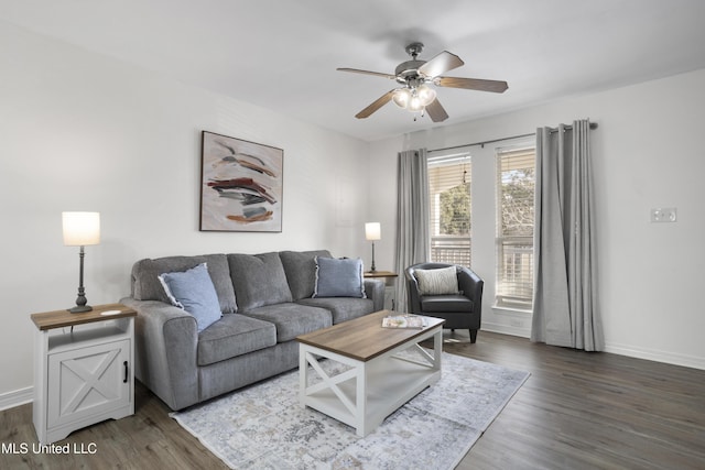 living room with hardwood / wood-style flooring and ceiling fan