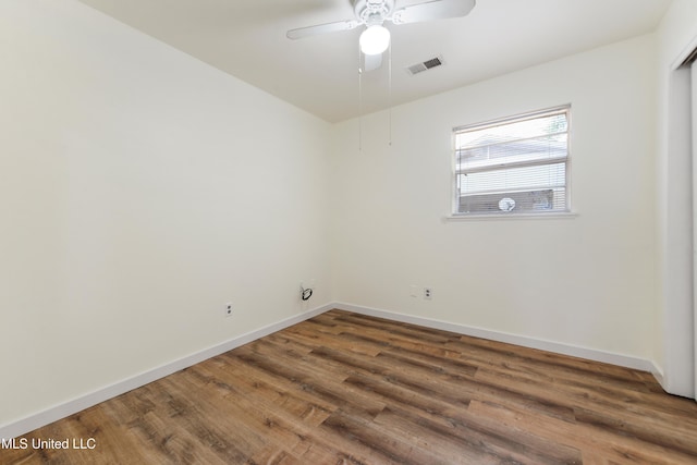 205 Walnut Dr, Ocean Springs, MS 39564 - spare room featuring wood finished floors and a ceiling fan