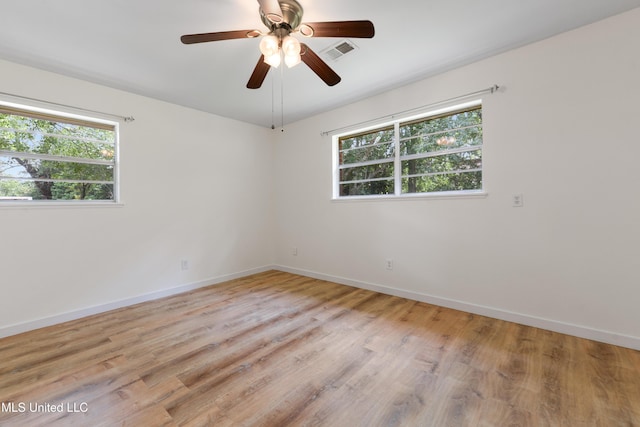 205 Walnut Dr, Ocean Springs, MS 39564 - spare room featuring light wood finished floors and ceiling fan