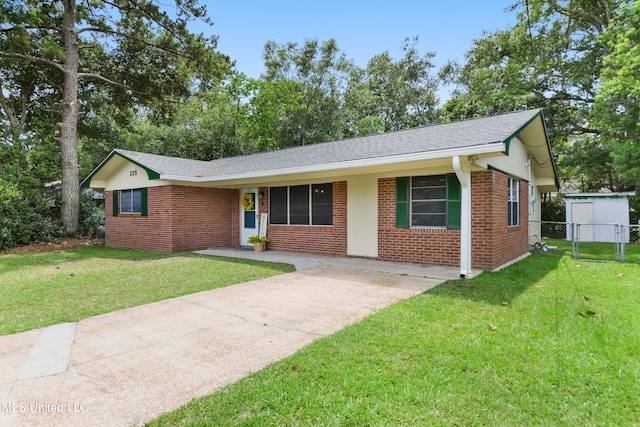 205 Walnut Dr, Ocean Springs, MS 39564 - ranch-style home with brick siding, roof with shingles, and concrete driveway