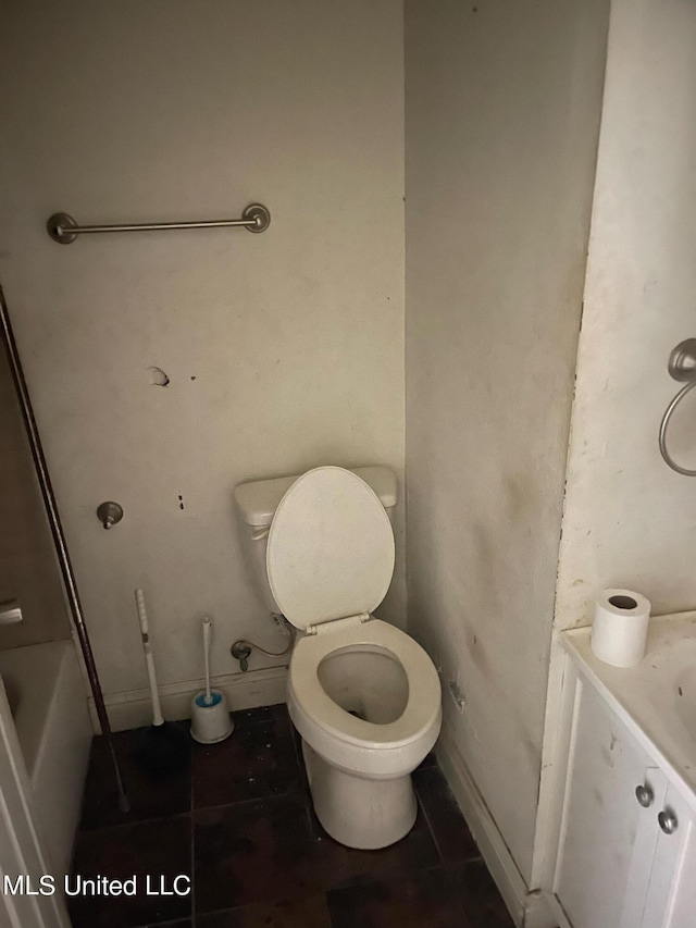 full bathroom featuring vanity, plus walk in shower, toilet, and tile patterned flooring