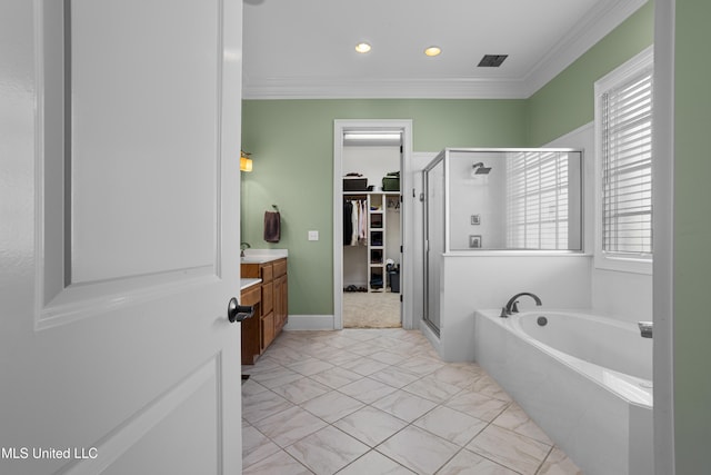 bathroom featuring vanity, crown molding, and plus walk in shower