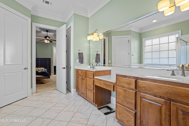 bathroom with vanity, ceiling fan, and ornamental molding