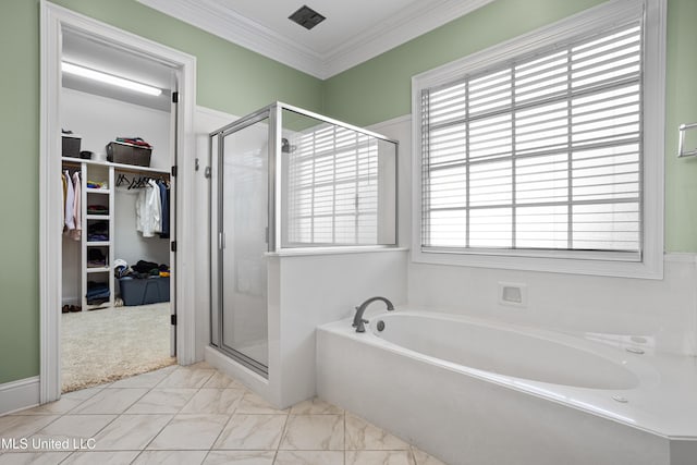 bathroom featuring separate shower and tub, a wealth of natural light, and crown molding