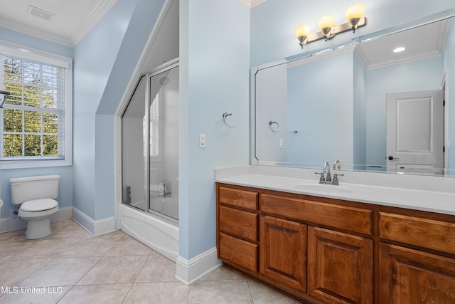 full bathroom featuring vanity, tile patterned flooring, toilet, enclosed tub / shower combo, and ornamental molding