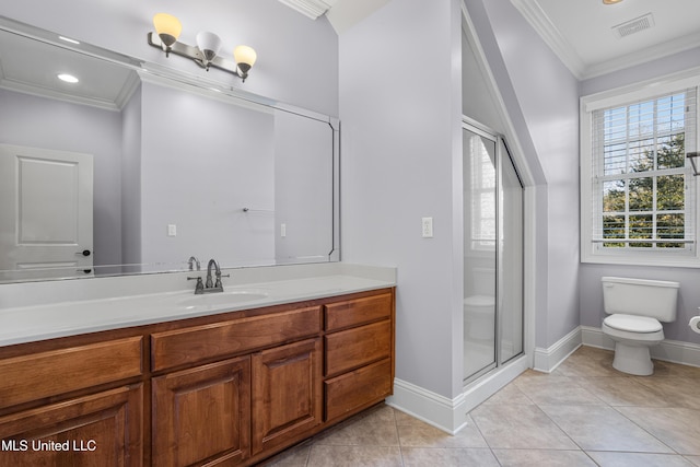 bathroom with vanity, a shower with door, tile patterned floors, crown molding, and toilet