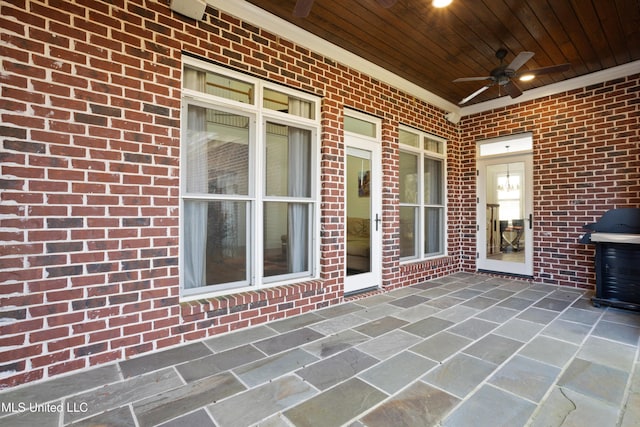 view of patio / terrace featuring area for grilling and ceiling fan