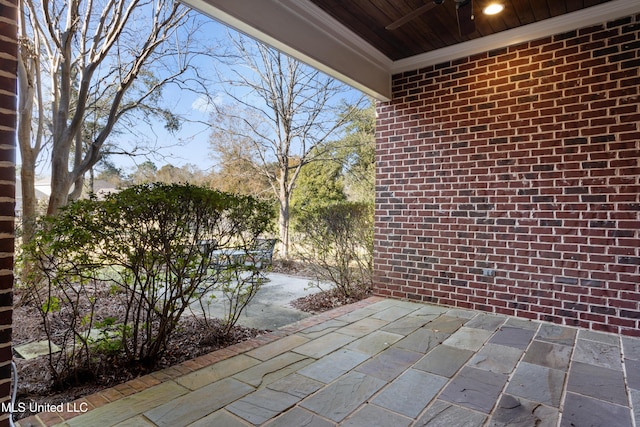 view of patio with ceiling fan