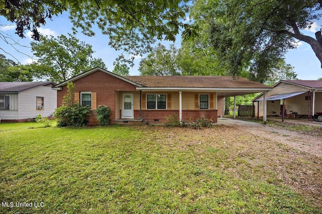 ranch-style home featuring a front lawn, crawl space, driveway, an attached carport, and brick siding