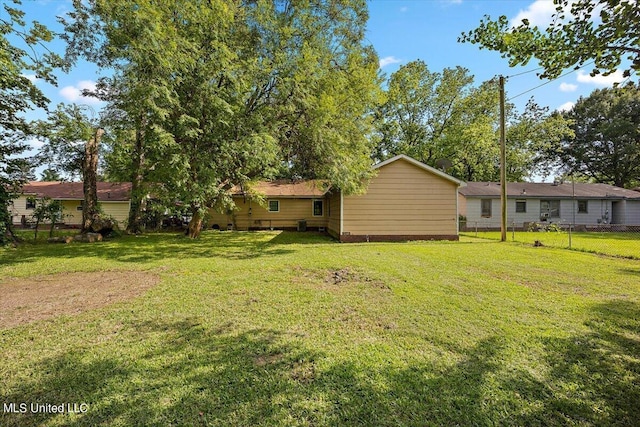 view of yard with fence