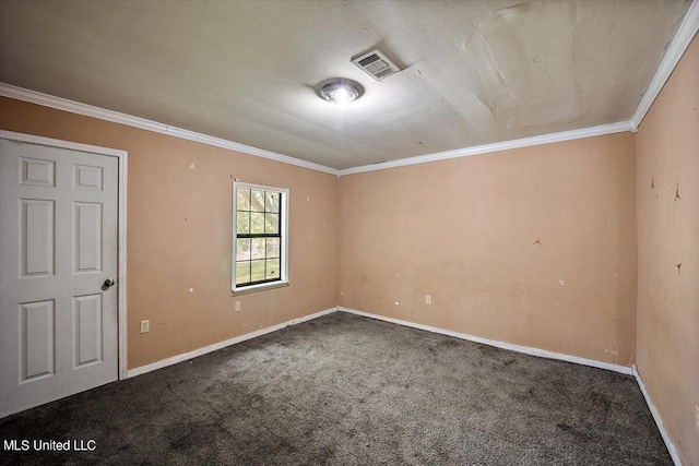 unfurnished room featuring carpet floors, ornamental molding, visible vents, and baseboards