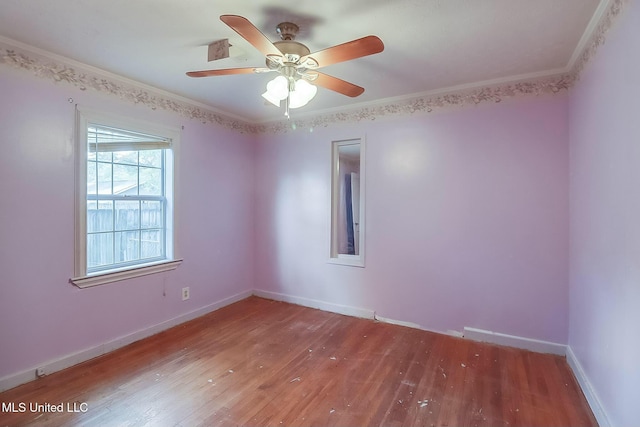 unfurnished room with ceiling fan, ornamental molding, and hardwood / wood-style floors