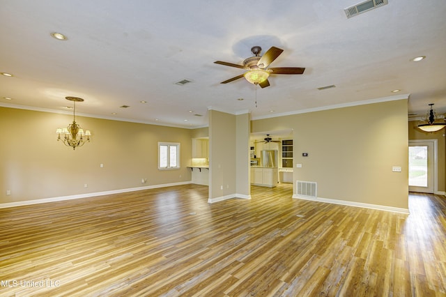 3099 E Fairway Dr, Brandon, MS 39047 - unfurnished living room featuring a ceiling fan, light wood-type flooring, a chandelier, baseboards, and recessed lighting