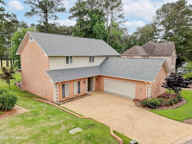 3099 E Fairway Dr, Brandon, MS 39047 - traditional-style house featuring brick siding, roof with shingles, concrete driveway, and a front lawn