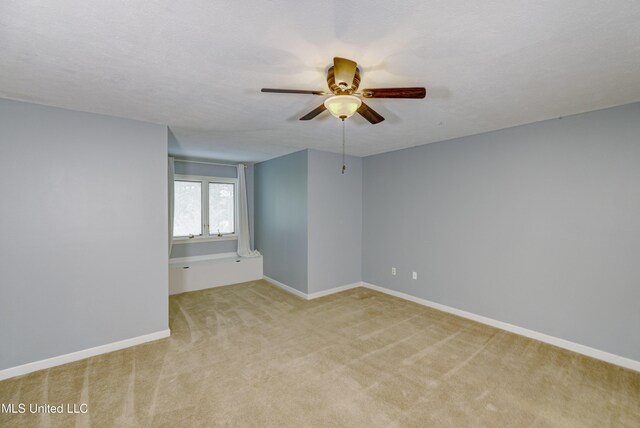3099 E Fairway Dr, Brandon, MS 39047 - unfurnished room with a ceiling fan, light carpet, and baseboards