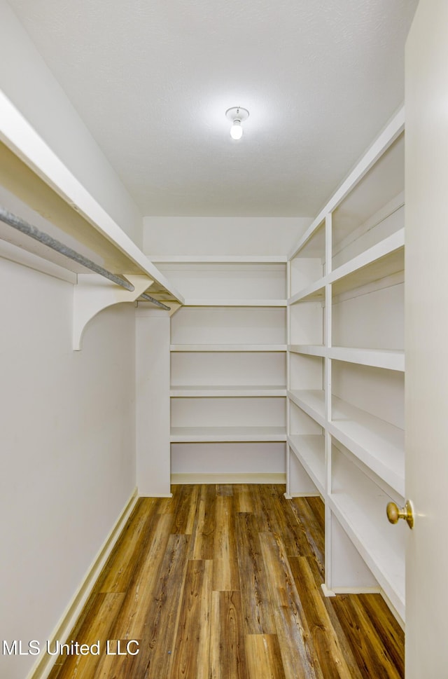 3099 E Fairway Dr, Brandon, MS 39047 - walk in closet featuring wood finished floors