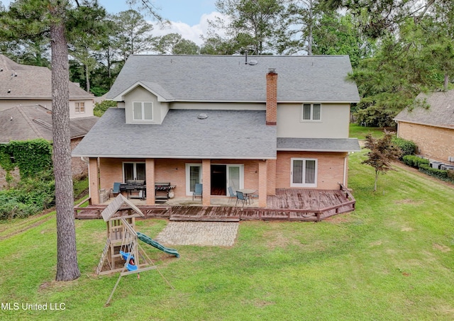 3099 E Fairway Dr, Brandon, MS 39047 - rear view of property featuring a shingled roof, a chimney, a lawn, and brick siding