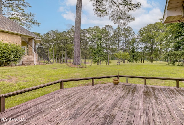 3099 E Fairway Dr, Brandon, MS 39047 - wooden terrace with a lawn and view of wooded area